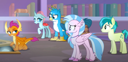 Size: 1283x620 | Tagged: safe, imported from derpibooru, screencap, gallus, ocellus, sandbar, silverstream, smolder, changedling, changeling, classical hippogriff, dragon, earth pony, griffon, hippogriff, pony, what lies beneath, cropped, smolder is not amused, unamused