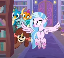 Size: 546x494 | Tagged: safe, imported from derpibooru, screencap, gallus, ocellus, sandbar, silverstream, smolder, yona, changedling, changeling, classical hippogriff, dragon, earth pony, griffon, hippogriff, pony, yak, what lies beneath, bookshelf, bow, cropped, flying, hair bow, jewelry, monkey swings, necklace, spread wings, student six, wings