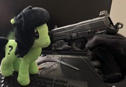 Size: 1170x810 | Tagged: safe, oc, oc:filly anon, clothes, computer, cooler, female, filly, gloves, gun, hand, irl, keyboard, monitor, photo, plushie, weapon