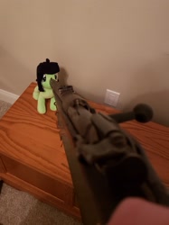 Size: 2451x3275 | Tagged: safe, oc, oc:filly anon, cabinet, clothes, female, filly, gloves, gun, hand, irl, outlet, photo, plushie, rifle, weapon