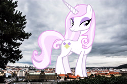 Size: 3936x2624 | Tagged: safe, artist:90sigma, artist:jaredking779, imported from derpibooru, fleur-de-lis, pony, unicorn, czech republic, female, giant pony, giant unicorn, giantess, high res, highrise ponies, irl, looking at you, macro, mare, mega giant, photo, ponies in real life, prague, smiling, solo, story included