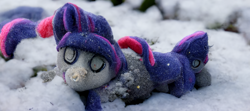 Size: 2304x1024 | Tagged: safe, imported from derpibooru, ai content, ai generated, damaged, deformed, depth of field, female, generator:midjourney, missing horn, plushie, realistic, snow, solo