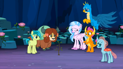 Size: 1600x900 | Tagged: safe, imported from derpibooru, screencap, gallus, ocellus, sandbar, silverstream, smolder, yona, changedling, changeling, classical hippogriff, dragon, earth pony, griffon, hippogriff, pony, yak, uprooted, bow, cloven hooves, colored hooves, eyes closed, hair bow, jewelry, monkey swings, necklace, student six