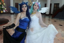 Size: 2140x1428 | Tagged: safe, artist:artisticdoe, artist:lochlan o'neil, imported from derpibooru, princess celestia, princess luna, human, anime weekend atlanta, bare shoulders, clothes, cosplay, costume, irl, irl human, photo, royal sisters, siblings, sisters, sleeveless