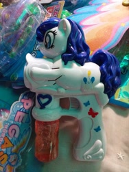 Size: 2448x3264 | Tagged: safe, artist:pony4koma, imported from derpibooru, rarity, earth pony, pony, unicorn, bootleg, female, irl, mare, merchandise, not pinkie pie, not rarity, photo, toy, watergun