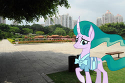 Size: 2144x1424 | Tagged: safe, artist:jaredking779, artist:jhayarr23, imported from derpibooru, mistmane, pony, unicorn, china, clothes, curved horn, female, horn, irl, looking at you, mare, photo, ponies in real life, raised hoof, shenzhen, smiling, solo