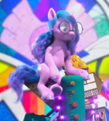 Size: 283x315 | Tagged: safe, imported from derpibooru, screencap, izzy moonbow, pony, unicorn, spoiler:my little pony: make your mark chapter 2, spoiler:myms01e01, cropped, g5, glasses, glowing, glowing horn, horn, izzy does it, my little pony: make your mark, my little pony: make your mark chapter 2, sitting, solo