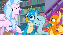 Size: 1600x899 | Tagged: safe, imported from derpibooru, screencap, gallus, ocellus, silverstream, smolder, changedling, changeling, classical hippogriff, dragon, griffon, hippogriff, school raze, bookshelf, dragoness, eyes closed, female, group, ladder, male, open mouth, quartet, school of friendship