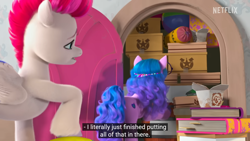 Size: 1366x768 | Tagged: safe, edit, edited screencap, imported from derpibooru, screencap, izzy moonbow, zipp storm, pegasus, pony, unicorn, spoiler:my little pony: make your mark chapter 2, spoiler:myms01e01, book, boxes, caption, closet, female, g5, izzy does it, logo, mare, meme, my little pony: make your mark, my little pony: make your mark chapter 2, netflix, netflix logo, pillow, text, youtube caption