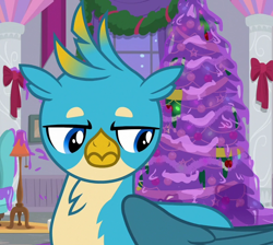 Size: 804x719 | Tagged: safe, imported from derpibooru, screencap, gallus, griffon, the hearth's warming club, christmas, christmas tree, cropped, gallus is not amused, holiday, male, solo, tree, unamused
