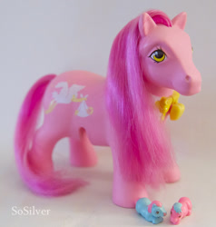 Size: 539x566 | Tagged: safe, imported from derpibooru, earth pony, pony, baby, baby pony, blue twin, female, filly, foal, g1, irl, mare, mother and child, mother and daughter, mummy pony, photo, pink twin, siblings, smiling, surprise twins pony, toy, twins, yellow eyes