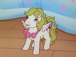 Size: 960x720 | Tagged: safe, imported from derpibooru, screencap, baby surprise, pegasus, pony, escape from catrina, my little pony 'n friends, baby, baby pony, bow, female, filly, foal, g1, jewelry, necklace, solo, spread wings, tail, tail bow, wings