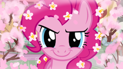 Size: 1280x720 | Tagged: safe, edit, edited screencap, editor:horsesplease, imported from derpibooru, screencap, pinkie pie, dryad, earth pony, plant pony, pony, tree pony, a friend in deed, season 2, adorabolical, bloom, cherry blossoms, close-up, cute, evil grin, flower, flower blossom, flower in hair, grin, looking at you, pink, sakura pie, smiling, smiling at you, smirk, solo, trapped, tree