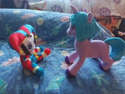 Size: 4000x3000 | Tagged: safe, artist:franklin, imported from derpibooru, izzy moonbow, pony, unicorn, caption this, g5, irl, jester, looking at each other, looking at someone, photo, plushie, pomni, the amazing digital circus, toy