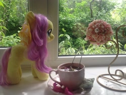 Size: 3264x2448 | Tagged: safe, artist:hysteriana, imported from derpibooru, fluttershy, pegasus, pony, aesthetics, blank flank, cup, flower, food, irl, looking at something, nature, petals, photo, plushie, summer, tea, teacup, toy, window