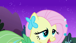 Size: 1153x649 | Tagged: safe, imported from derpibooru, screencap, fluttershy, pegasus, pony, season 1, the best night ever, animation error, at the gala, clothes, derp, dress, faic, female, g4, gala dress, mare, night, night sky, open mouth, sky, smiling, solo, starry night, tongue out