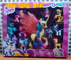 Size: 500x425 | Tagged: safe, imported from derpibooru, apple bloom, applejack, fluttershy, pinkie pie, princess cadance, princess celestia, princess flurry heart, princess gold lily, rainbow dash, spike, sweetie belle, alicorn, dragon, earth pony, pony, unicorn, ages 3+, baby, baby pony, blind bag, bootleg, chinese, choking hazard, crown, female, filly, foal, fun lovely pony, jewelry, mare, photo, regalia, stock vector, stolen fanart, tiara, toy, transparent wings, wings