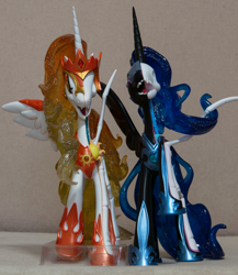 Size: 4000x4616 | Tagged: safe, imported from derpibooru, daybreaker, nightmare moon, alicorn, pony, dissectibles, duo, female, freeny's hidden dissectibles, mare, merchandise, metal as fuck, photo