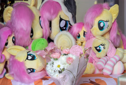 Size: 5119x3456 | Tagged: safe, artist:natureshy, imported from derpibooru, fluttershy, pegasus, pony, bed, bouquet, bouquet of flowers, clothes, cute, flower, heart, heart eyes, hearts and hooves day, holiday, multeity, photo, plushie, pony plushie, present, shyabetes, so much flutter, socks, striped socks, valentine's day, wingding eyes