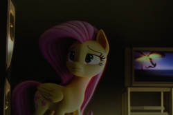 Size: 768x512 | Tagged: safe, imported from derpibooru, fluttershy, pegasus, pony, ai content, ai generated, black eye, blurry background, eyes open, movie, pink hair, pink mane, realistic, room, sad, solo, television