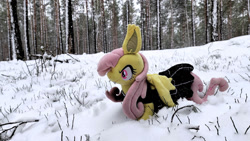 Size: 1191x671 | Tagged: safe, artist:mgrdash, imported from derpibooru, fluttershy, bat pony, pony, bat ponified, clothes, dress, flutterbat, forest, irl, photo, plushie, ponies in real life, race swap, snow, winter