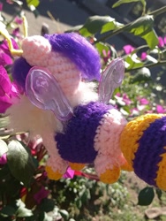 Size: 1800x2399 | Tagged: safe, artist:casquitos kawaii, imported from derpibooru, pipp petals, bee, bee pony, insect, original species, amigurumi, bumblebee, bumblebipp, crochet, flower, g5, handmade, irl, photo, plushie, solo