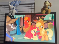 Size: 4032x3024 | Tagged: safe, artist:allunacraft, imported from derpibooru, apple bloom, applejack, big macintosh, burnt oak, ponyta, rapidash, the perfect pear, floppy ears, irl, photo, picture of a screen, plushie, pokémon, television