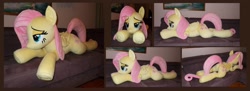 Size: 2304x836 | Tagged: safe, artist:calusariac, imported from derpibooru, fluttershy, pony, irl, lying down, photo, plushie, prone, solo