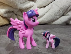 Size: 4000x3000 | Tagged: safe, imported from derpibooru, photographer:professorventurer, twilight sparkle, alicorn, pony, duality, irl, photo, self paradox, self ponidox, size difference, tiny twi, toy, twilight sparkle (alicorn)