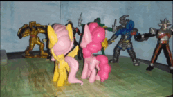 Size: 994x558 | Tagged: safe, artist:dex stewart, imported from derpibooru, fluttershy, pinkie pie, earth pony, pegasus, pony, animated, goldar, mighty morphin power rangers, power rangers, sound, stop motion, toy, webm