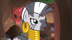 Size: 360x202 | Tagged: safe, imported from derpibooru, screencap, zecora, bee, insect, zebra, a rockhoof and a hard place, season 7, animated, bee sting, bottle, ear piercing, earring, falling, female, gif, imgflip, injured, jewelry, mare, mask, messy mane, neck rings, open mouth, piercing, shocked, shocked expression, solo, unamused, zecora is not amused, zecora's hut