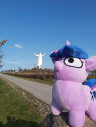 Size: 4896x6528 | Tagged: safe, artist:k.r.e.d.k.e, imported from derpibooru, twilight sparkle, pony, unicorn, absurd resolution, christ the king statue, irl, photo, plushie, poland, statue, twiggie, unicorn twilight, świebodzin