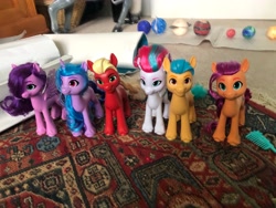 Size: 4032x3024 | Tagged: safe, imported from derpibooru, hitch trailblazer, izzy moonbow, pipp petals, sprout cloverleaf, sunny starscout, zipp storm, earth pony, pegasus, pony, unicorn, comb, female, g5, irl, male, mane five (g5), mare, new mane six (g5), photo, stallion, toy