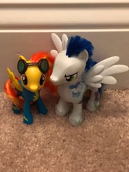 Size: 3024x4032 | Tagged: safe, imported from derpibooru, soarin', spitfire, pegasus, pony, best friends, carpet, clothes, cute, duo, duo male and female, female, irl, male, mare, not shipping, photo, spread wings, stallion, toy, uniform, wings, wonderbolts, wonderbolts uniform