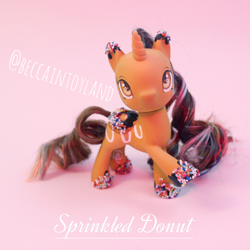 Size: 2048x2048 | Tagged: safe, artist:beccaintoyland, imported from derpibooru, oc, oc:sprinkled donut, pony, unicorn, body markings, brown coat, brown hair, brown mane, chocolate, colored hooves, curly mane, customized toy, donut, food, g4, g4.5, irl, multicolored mane, orange eyes, photo, pink mane, repaint, sprinkles, toy