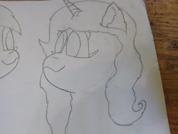 Size: 4608x3456 | Tagged: safe, artist:acid flask, imported from derpibooru, dark moon, graphite, izzy moonbow, pony, unicorn, 2d, art dump, female, g5, happy, mare, paper, sketch, sketch dump, sketchbook, smiling, solo, traditional art