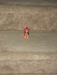 Size: 3024x4032 | Tagged: safe, imported from derpibooru, sunny starscout, earth pony, pony, bag, carpet, carpeted stairs, female, g5, irl, mare, photo, photo from a distance, smol, solo, stairs, sunny starscout's bag, toy