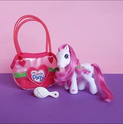 Size: 719x722 | Tagged: safe, imported from derpibooru, strawberry swirl, earth pony, pony, 2000s, female, food, g3, irl, merchandise, my little pony logo, photo, solo, strawberry, toy