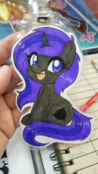 Size: 1152x2048 | Tagged: safe, artist:inkkeystudios, imported from derpibooru, oc, oc only, pony, unicorn, badge, looking at you, open mouth, open smile, photo, sitting, smiling, solo, traditional art