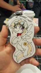 Size: 1152x2048 | Tagged: safe, artist:inkkeystudios, imported from derpibooru, oc, oc only, oc:wing nut, pegasus, pony, :3, badge, eye clipping through hair, flying, goggles, goggles on head, looking at you, neckerchief, photo, smiling, traditional art, unshorn fetlocks