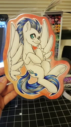 Size: 5312x2988 | Tagged: safe, artist:inkkeystudios, imported from derpibooru, oc, oc only, pony, badge, flying, looking at you, photo, smiling, solo, spread wings, traditional art, underhoof, wings