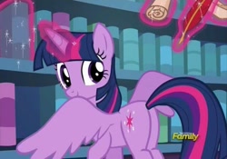 Size: 590x414 | Tagged: safe, imported from derpibooru, screencap, twilight sparkle, alicorn, the fault in our cutie marks, book, bookshelf, butt, discovery family, discovery family logo, library, logo, plot, quill, scroll, smiling, solo, spread wings, twibutt, twilight sparkle (alicorn), twilight's castle, twilight's castle library, wings