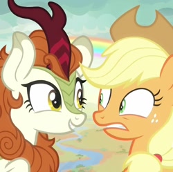 Size: 1086x1080 | Tagged: safe, imported from derpibooru, screencap, applejack, autumn blaze, earth pony, kirin, pony, season 8, sounds of silence, spoiler:s08, a kirin tale, cropped, duo, duo female, eye contact, female, looking at each other, looking at someone, mare, rainbow, singing, uneasy