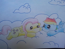Size: 640x480 | Tagged: safe, artist:fluttersdoodles, imported from derpibooru, fluttershy, rainbow dash, cloud, female, flutterdash, holding hooves, lesbian, looking at each other, looking at someone, lying down, lying on a cloud, on a cloud, shipping, sky