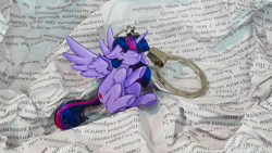Size: 1280x720 | Tagged: safe, artist:made_by_franch, imported from derpibooru, twilight sparkle, alicorn, book, craft, figure, floppy ears, g1, handmade, keychain, read, solo, trinket, twilight sparkle (alicorn)