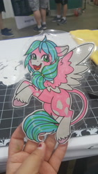 Size: 5312x2988 | Tagged: safe, artist:inkkeystudios, imported from derpibooru, oc, oc only, pony, badge, colored wings, colored wingtips, flying, happy, leonine tail, open mouth, open smile, photo, smiling, solo, tail, traditional art, two toned wings, unshorn fetlocks, wings