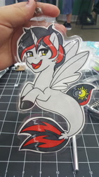 Size: 5312x2988 | Tagged: safe, artist:inkkeystudios, imported from derpibooru, oc, oc only, pony, seapony (g4), unicorn, :3, badge, lidded eyes, looking at you, open mouth, open smile, photo, smiling, solo, spread wings, traditional art, wings