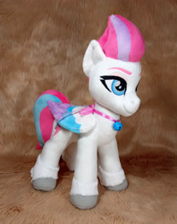 Size: 2550x3220 | Tagged: safe, artist:doctorkoda, imported from derpibooru, zipp storm, pegasus, pony, bell, female, folded wings, g5, irl, jewelry, mare, necklace, photo, plushie, smiling, solo, standing, wings