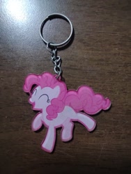 Size: 972x1296 | Tagged: safe, derpibooru exclusive, imported from derpibooru, pinkie pie, earth pony, pony, eyes closed, female, irl, keychain, mare, merchandise, photo, smiling, solo