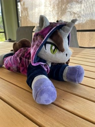 Size: 3024x4032 | Tagged: safe, artist:4everlovedcreationco, imported from derpibooru, pony, unicorn, colored hooves, disguise, disguised siren, hood, hood up, horn, irl, kellin quinn, lying down, male, onesie, photo, plushie, ponified, prone, sleeping with sirens, slit pupils, solo, stallion